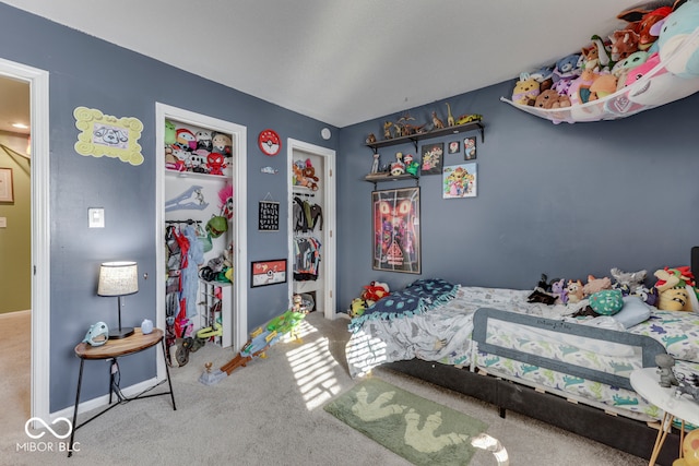 carpeted bedroom with a closet