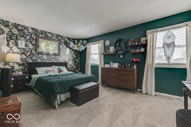 carpeted bedroom with a textured ceiling