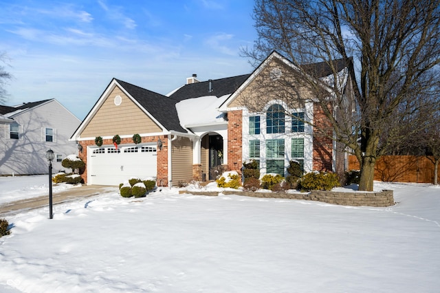 view of front of home with a garage