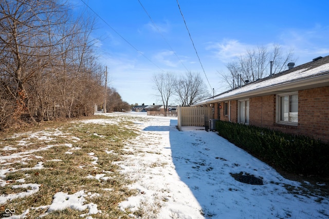 view of yard covered in snow