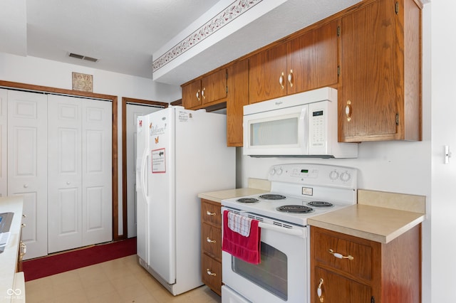 kitchen with white appliances