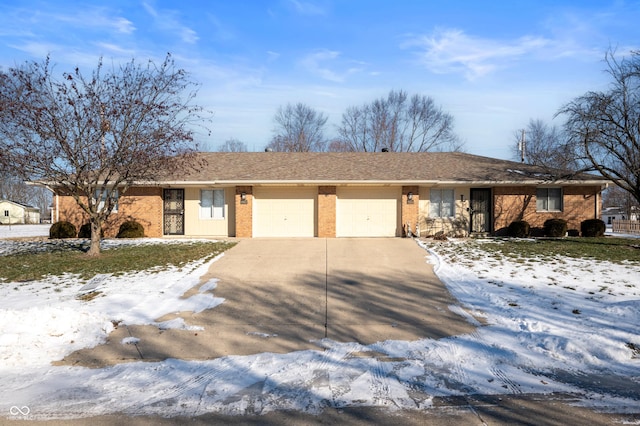 single story home with a garage