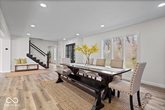 dining room with light hardwood / wood-style floors