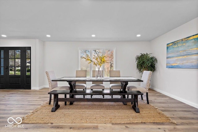 dining room featuring hardwood / wood-style flooring