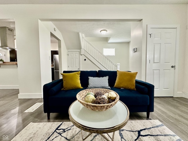 living room with hardwood / wood-style floors