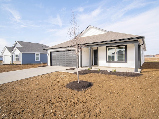 ranch-style house featuring a garage