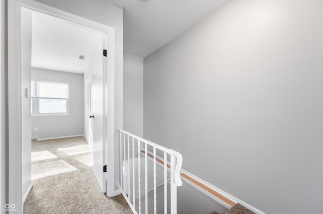 corridor featuring carpet