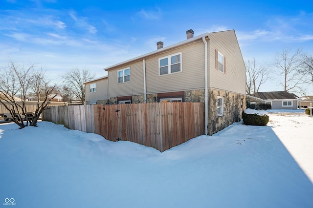 view of snow covered property