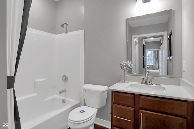 full bathroom with toilet, vanity, and bathing tub / shower combination