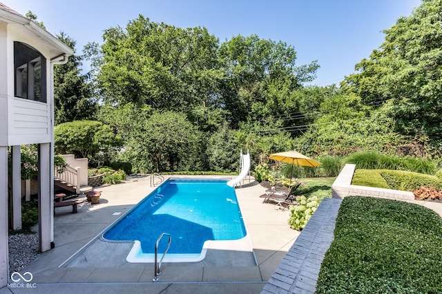 8526 Oakmont Ln, Indianapolis, IN 46260 - view of pool featuring a patio and a water slide