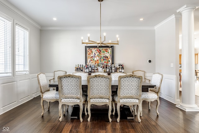 8526 Oakmont Ln, Indianapolis, IN 46260 - dining space featuring decorative columns, ornamental molding, dark hardwood / wood-style floors, and an inviting chandelier