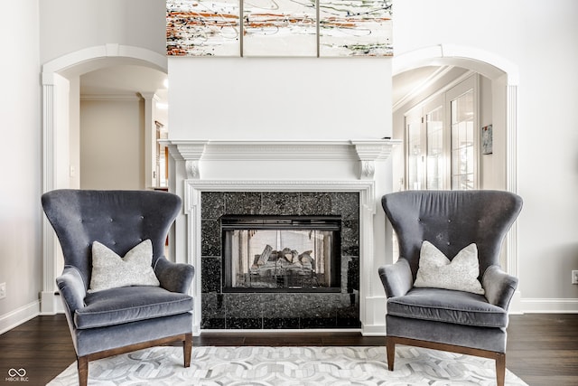 8526 Oakmont Ln, Indianapolis, IN 46260 - living area featuring hardwood / wood-style flooring, ornamental molding, and a towering ceiling