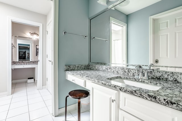 8526 Oakmont Ln, Indianapolis, IN 46260 - bathroom with vanity and tile patterned flooring
