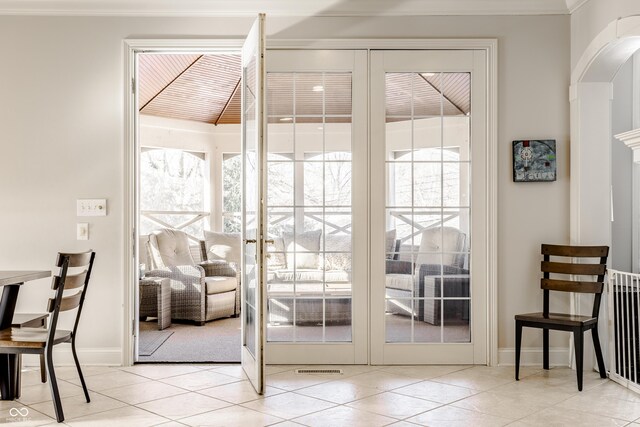 8526 Oakmont Ln, Indianapolis, IN 46260 - doorway to outside with light tile patterned floors and french doors