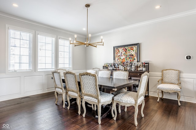 8526 Oakmont Ln, Indianapolis, IN 46260 - dining room featuring ornamental molding, dark hardwood / wood-style floors, and a chandelier