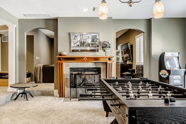 8526 Oakmont Ln, Indianapolis, IN 46260 - rec room featuring carpet flooring and a tile fireplace