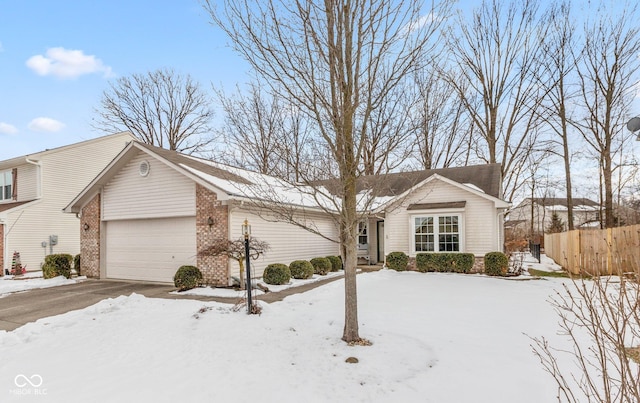 single story home with a garage