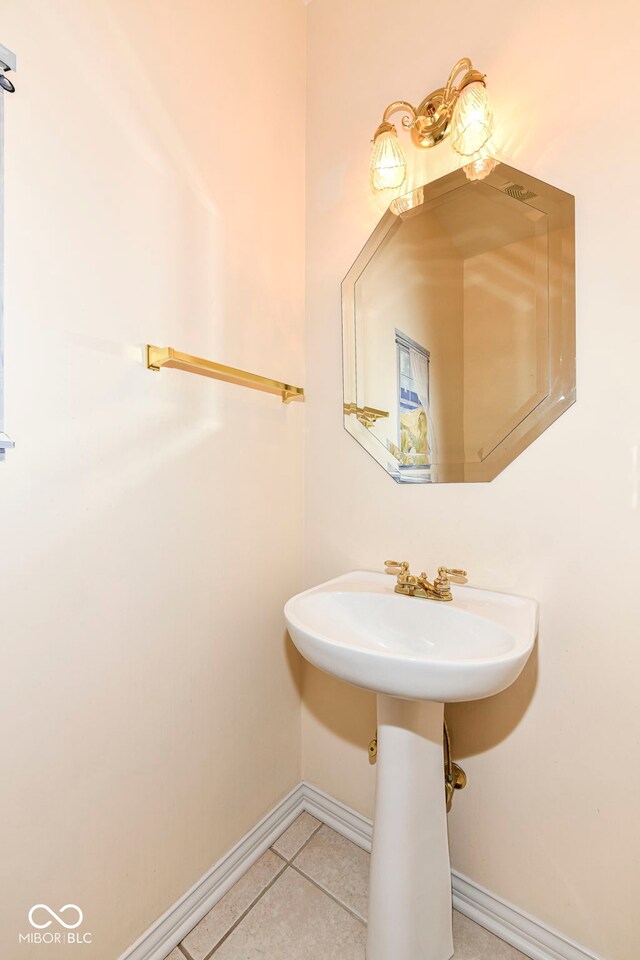 bathroom with tile patterned flooring