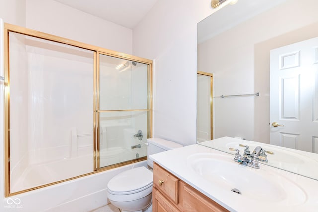 full bathroom with shower / bath combination with glass door, vanity, and toilet