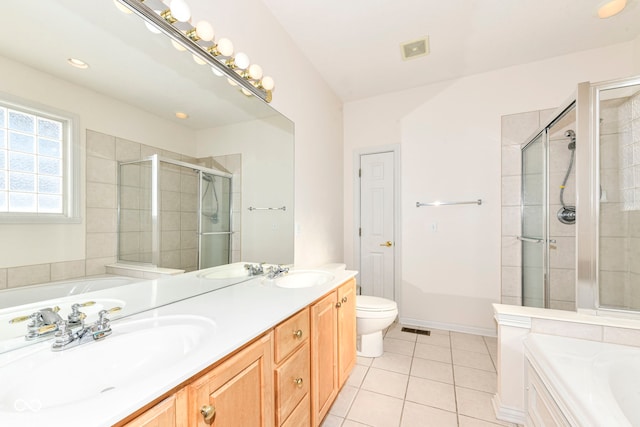 full bathroom featuring toilet, tile patterned flooring, shower with separate bathtub, and vanity