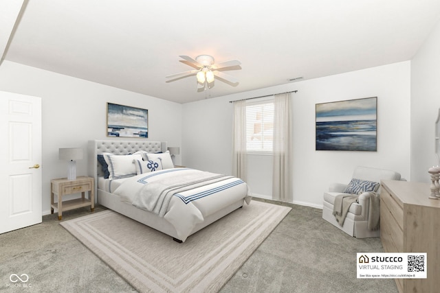 carpeted bedroom featuring ceiling fan