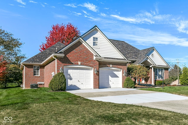 view of front property featuring a garage and a front yard