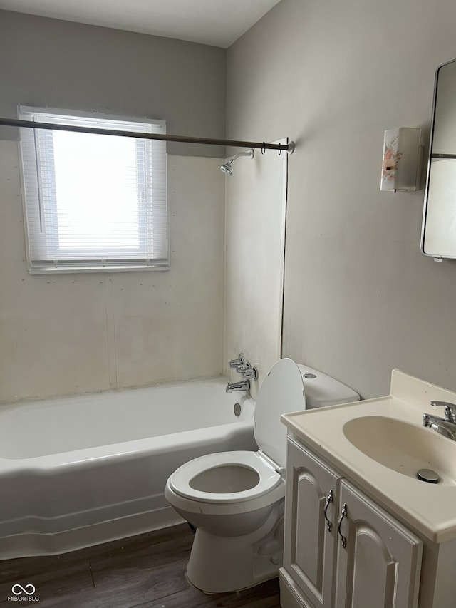 full bathroom featuring shower / tub combination, toilet, vanity, and hardwood / wood-style flooring