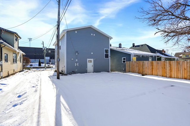 view of snow covered property