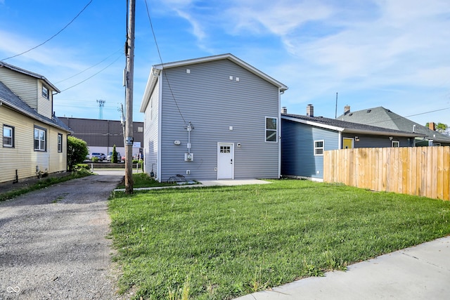 1446 E Naomi St, Indianapolis, IN 46203 - back of property with fence and a yard