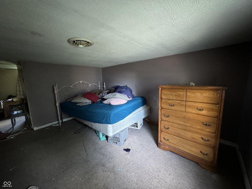 bedroom with a textured ceiling