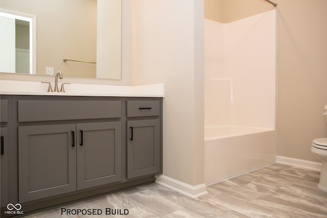 full bathroom featuring toilet, vanity, and shower / bathtub combination