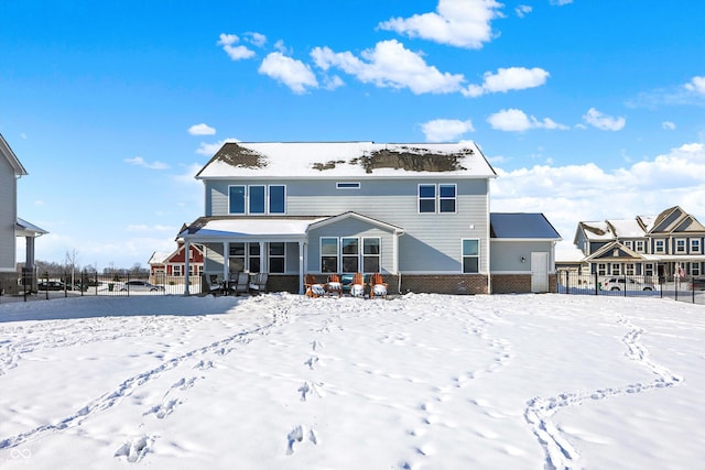 view of snow covered property