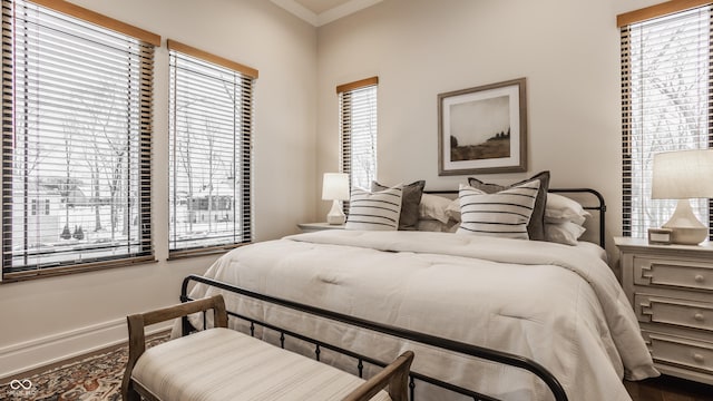 bedroom with ornamental molding