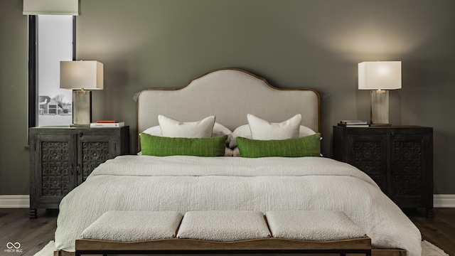 bedroom featuring dark hardwood / wood-style floors