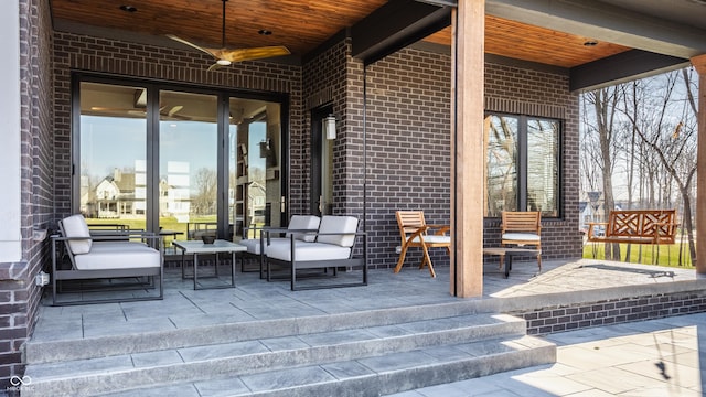 view of patio featuring an outdoor hangout area and ceiling fan