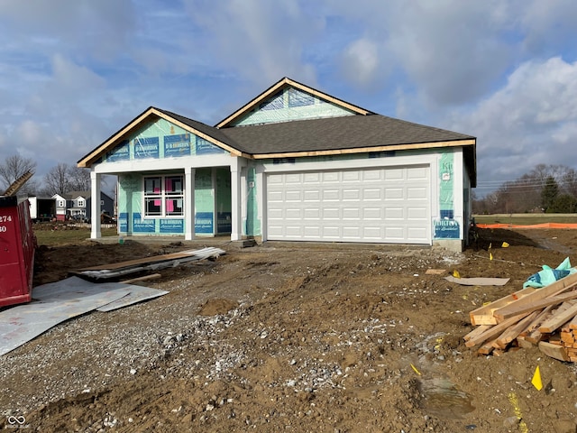 view of front of property with a garage