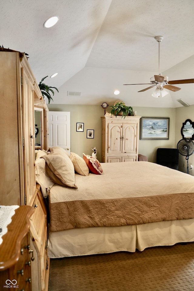 bedroom featuring ceiling fan, lofted ceiling, and carpet floors