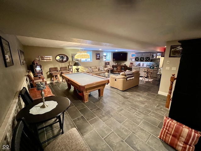 recreation room with indoor bar and pool table