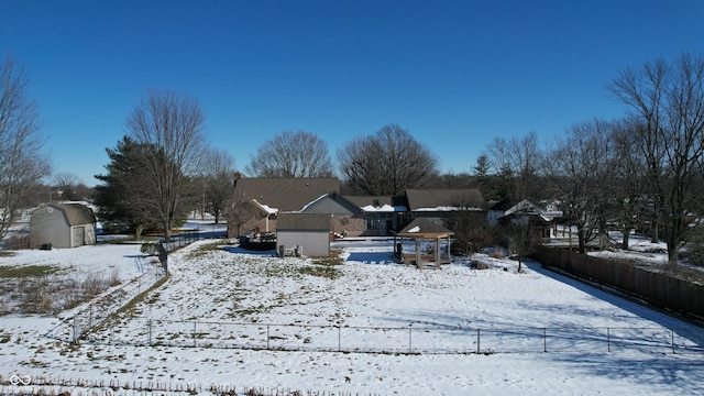 view of yard layered in snow