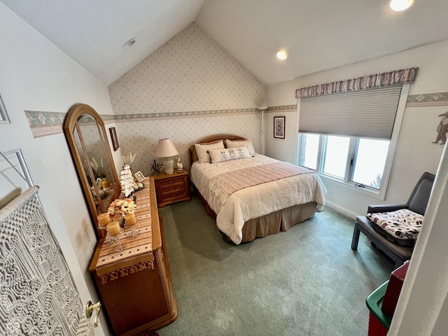 carpeted bedroom featuring lofted ceiling