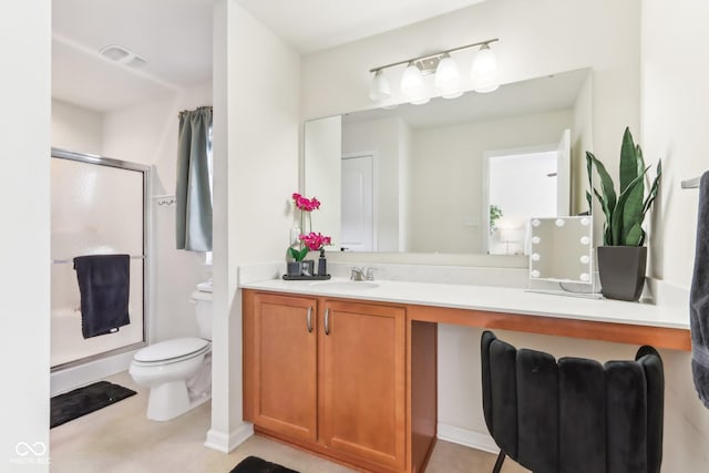 bathroom with toilet, an enclosed shower, and vanity