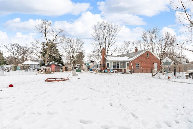 view of yard layered in snow