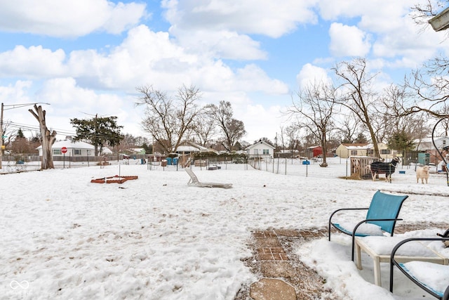 view of yard covered in snow