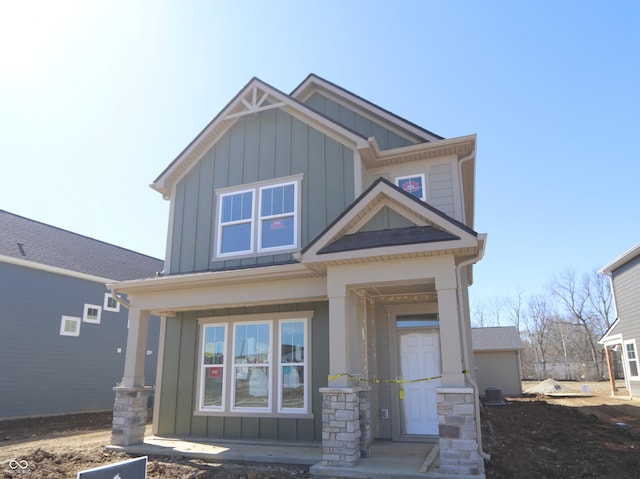 craftsman-style home with board and batten siding