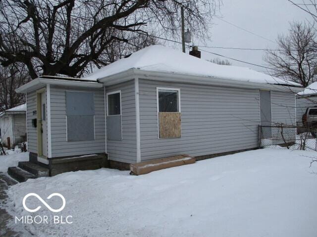 view of snow covered property