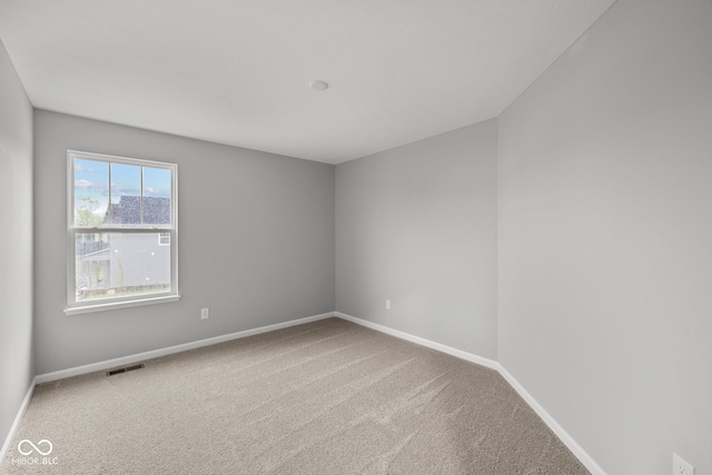 1721 Real St, Indianapolis, IN 46240 - carpeted spare room featuring baseboards