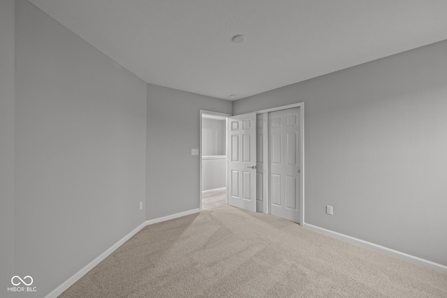 1721 Real St, Indianapolis, IN 46240 - unfurnished bedroom featuring baseboards, carpet flooring, and a closet