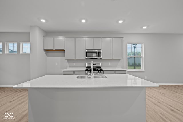 1721 Real St, Indianapolis, IN 46240 - kitchen with appliances with stainless steel finishes, light wood-type flooring, healthy amount of natural light, baseboards, and recessed lighting