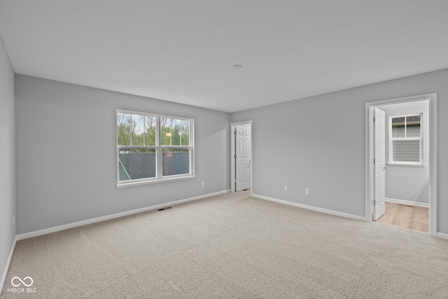 1721 Real St, Indianapolis, IN 46240 - carpeted empty room with baseboards
