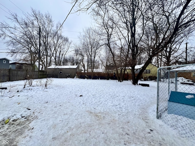 view of yard covered in snow